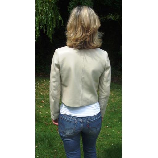 womens-collarless-leather-jacket-patch-pockets-back.jpg